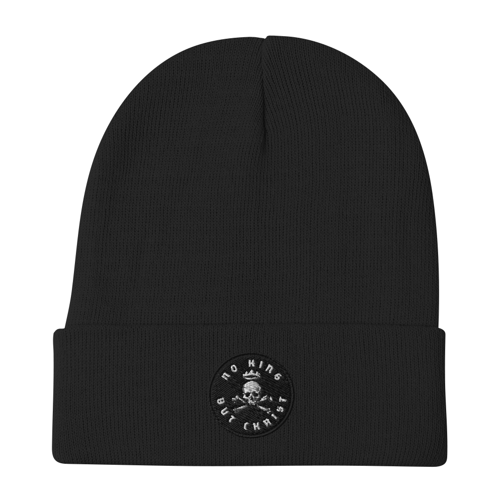 Black embroidered beanie with No King But Christ seal, clean stitching, uncluttered design.